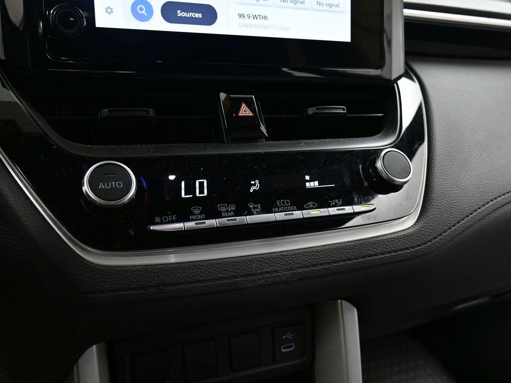 used 2024 Toyota Corolla Cross Hybrid car, priced at $29,500