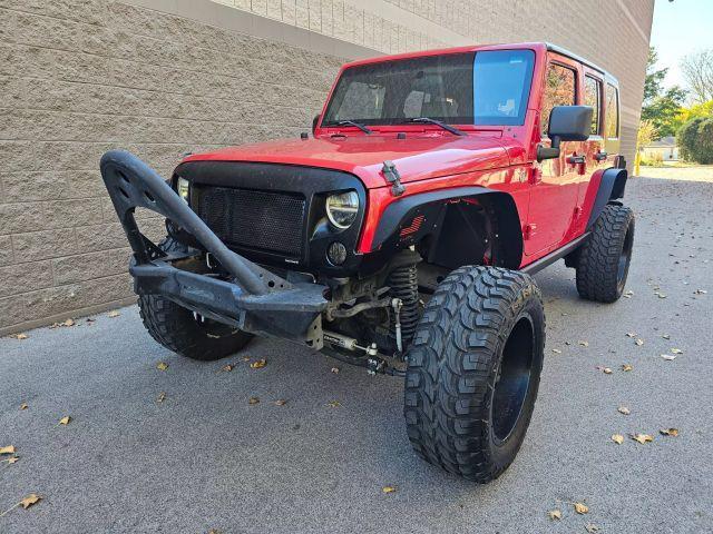 used 2010 Jeep Wrangler Unlimited car, priced at $13,995