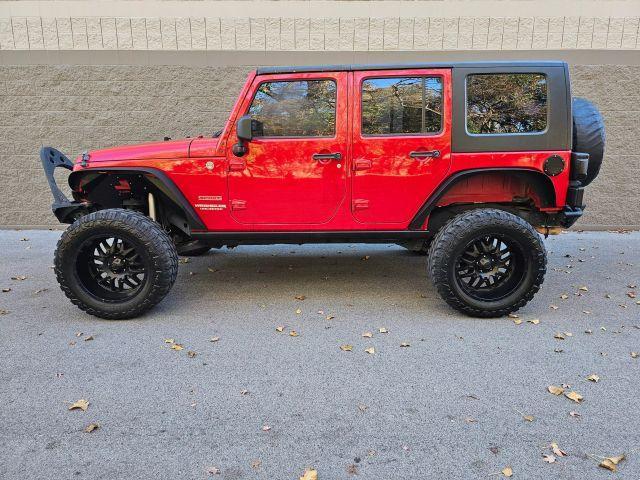 used 2010 Jeep Wrangler Unlimited car, priced at $13,995