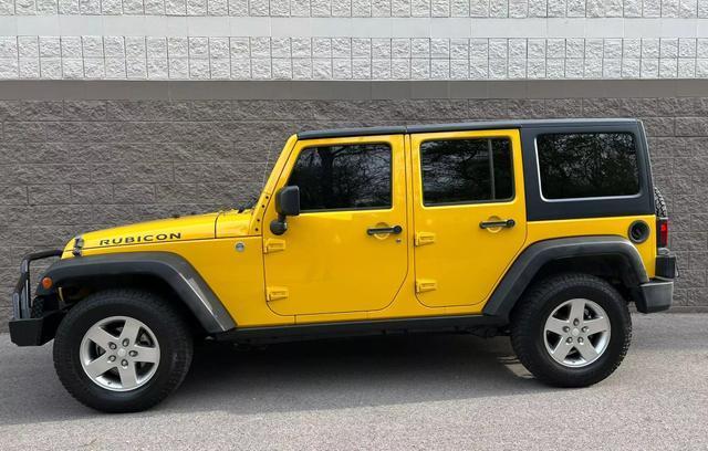 used 2011 Jeep Wrangler Unlimited car, priced at $18,995