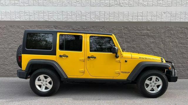 used 2011 Jeep Wrangler Unlimited car, priced at $18,995