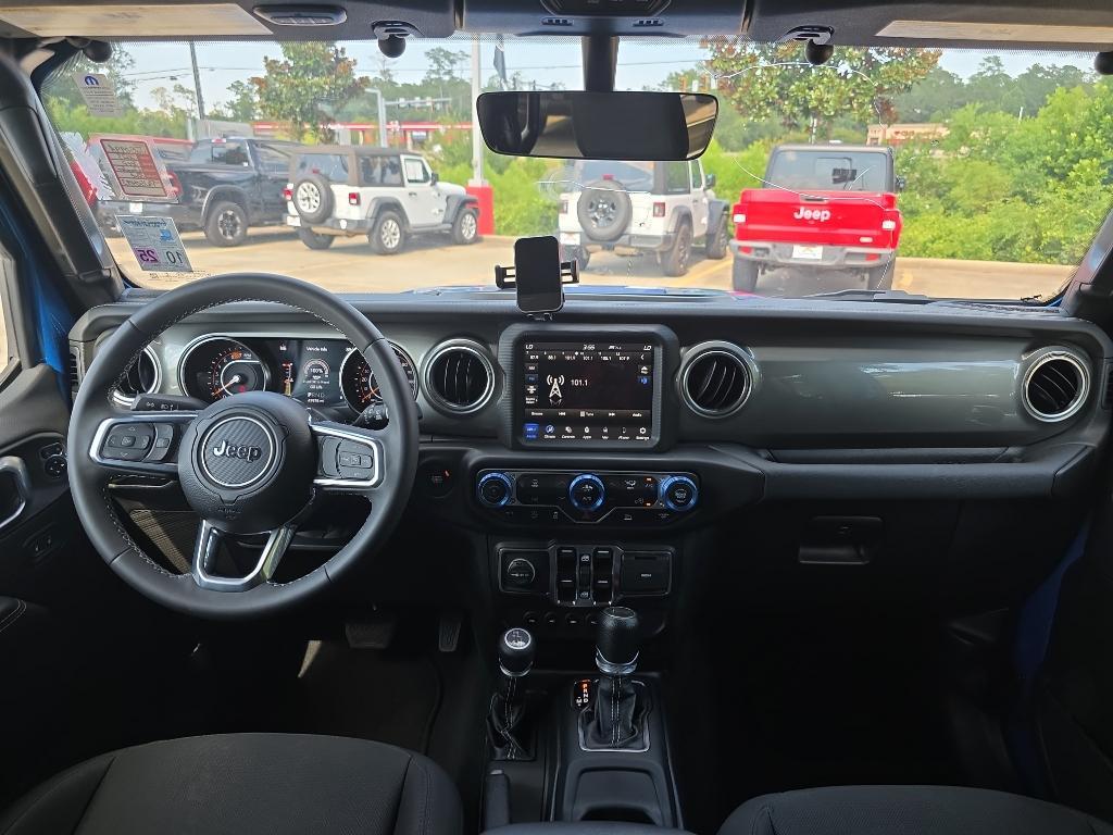used 2023 Jeep Wrangler car, priced at $33,995