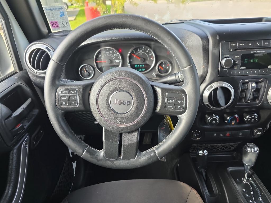 used 2015 Jeep Wrangler Unlimited car, priced at $16,995