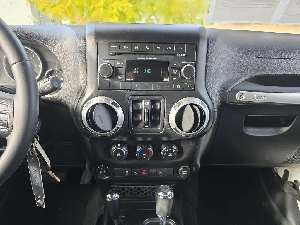 used 2015 Jeep Wrangler Unlimited car, priced at $16,995