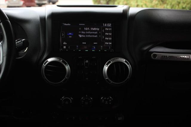 used 2013 Jeep Wrangler Unlimited car, priced at $21,988