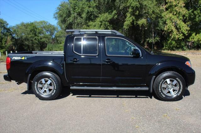 used 2013 Nissan Frontier car, priced at $19,999