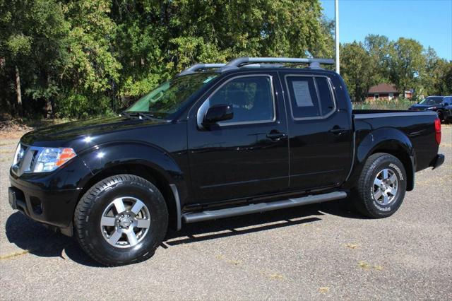 used 2013 Nissan Frontier car, priced at $19,999