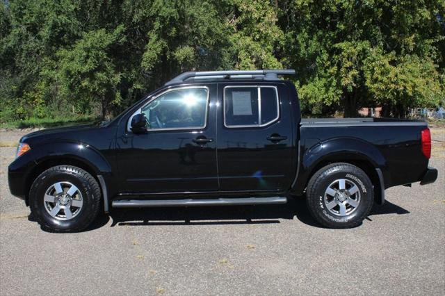 used 2013 Nissan Frontier car, priced at $19,999