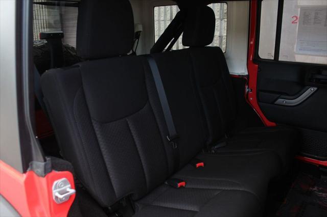 used 2013 Jeep Wrangler Unlimited car, priced at $20,990