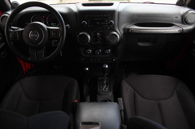 used 2013 Jeep Wrangler Unlimited car, priced at $20,990