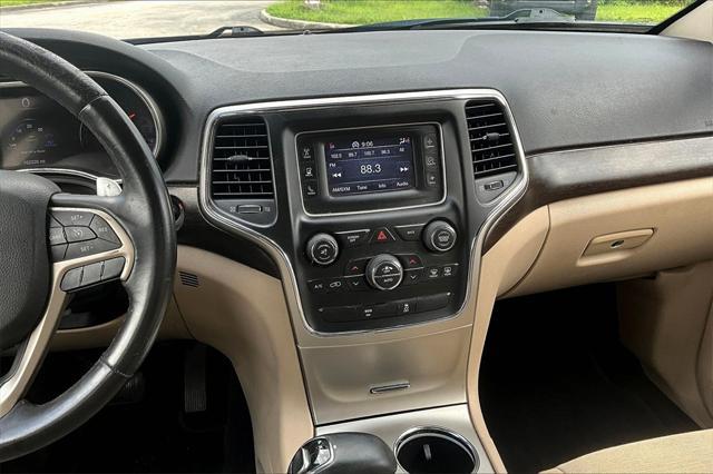 used 2014 Jeep Grand Cherokee car, priced at $4,999