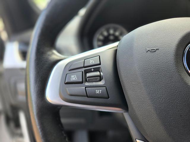 used 2018 BMW X1 car, priced at $15,675