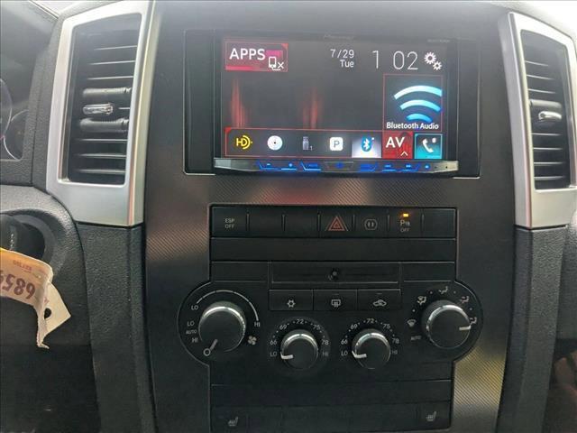 used 2010 Jeep Grand Cherokee car, priced at $19,590