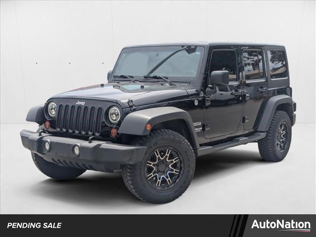 used 2011 Jeep Wrangler Unlimited car, priced at $12,990