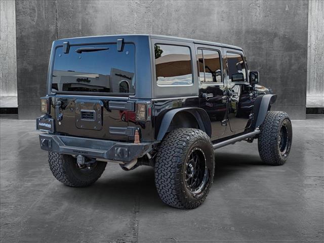 used 2015 Jeep Wrangler Unlimited car, priced at $21,100