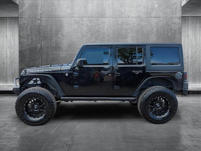 used 2015 Jeep Wrangler Unlimited car, priced at $21,100