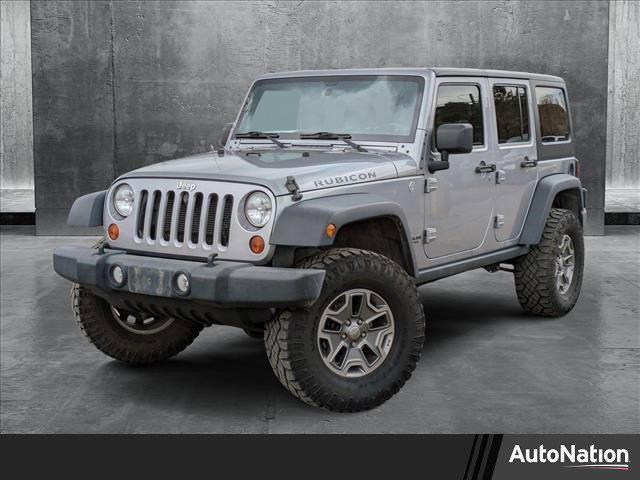 used 2013 Jeep Wrangler Unlimited car, priced at $17,490