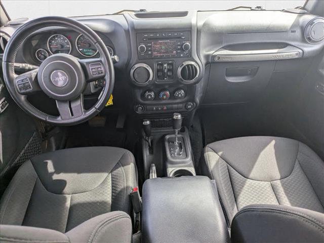 used 2015 Jeep Wrangler Unlimited car, priced at $18,490