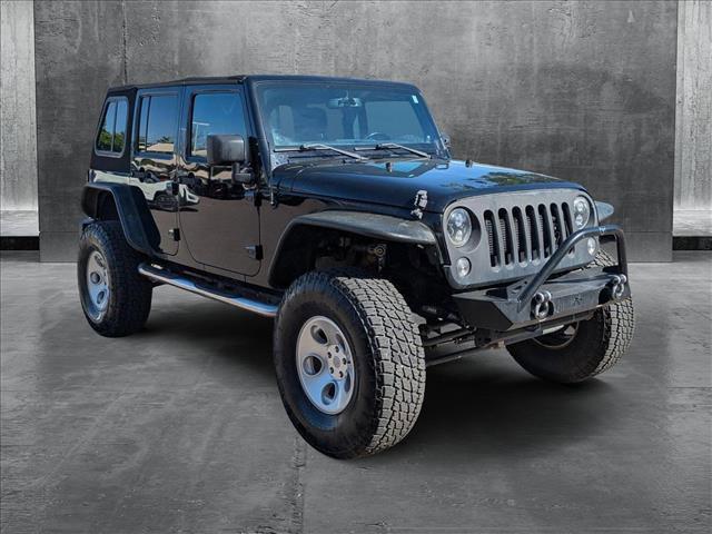 used 2014 Jeep Wrangler Unlimited car, priced at $14,449