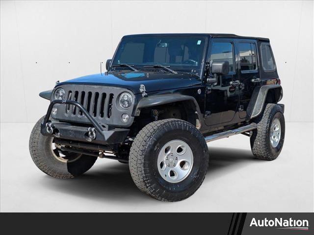 used 2014 Jeep Wrangler Unlimited car, priced at $12,490
