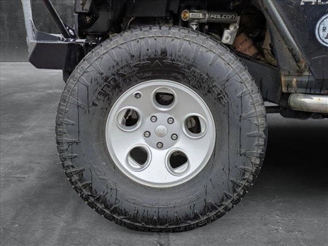 used 2014 Jeep Wrangler Unlimited car, priced at $14,790