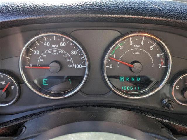 used 2014 Jeep Wrangler Unlimited car, priced at $14,449