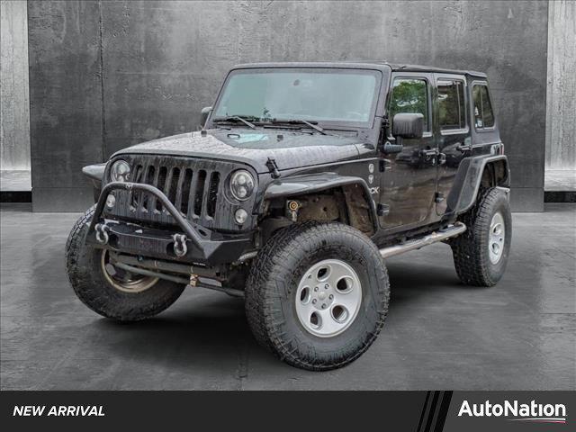 used 2014 Jeep Wrangler Unlimited car, priced at $14,790