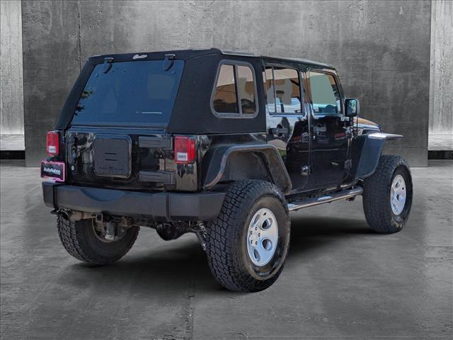 used 2014 Jeep Wrangler Unlimited car, priced at $14,449