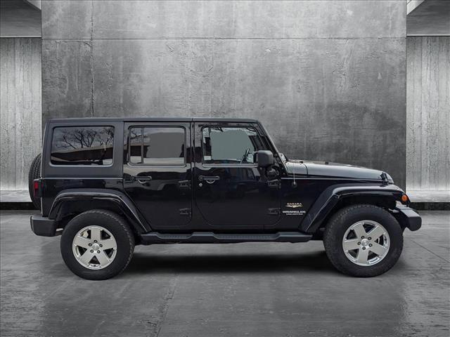 used 2012 Jeep Wrangler Unlimited car, priced at $18,680