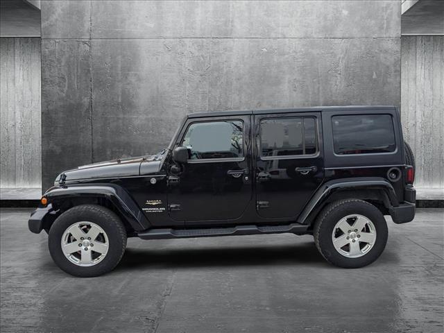 used 2012 Jeep Wrangler Unlimited car, priced at $18,680