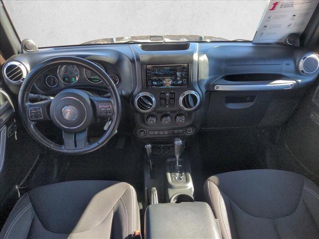 used 2013 Jeep Wrangler Unlimited car, priced at $15,490