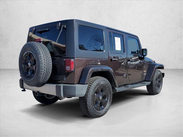 used 2013 Jeep Wrangler Unlimited car, priced at $15,490