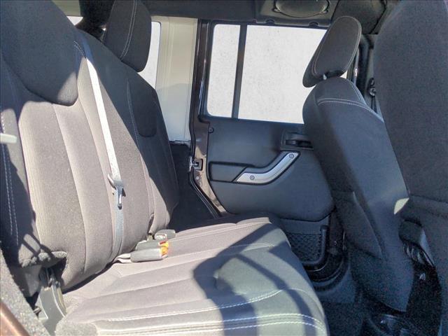 used 2013 Jeep Wrangler Unlimited car, priced at $15,490