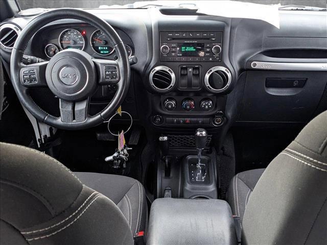 used 2015 Jeep Wrangler car, priced at $19,290