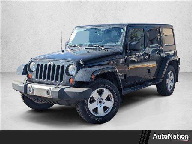 used 2012 Jeep Wrangler Unlimited car, priced at $16,990