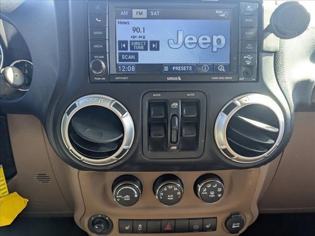 used 2012 Jeep Wrangler Unlimited car, priced at $16,990