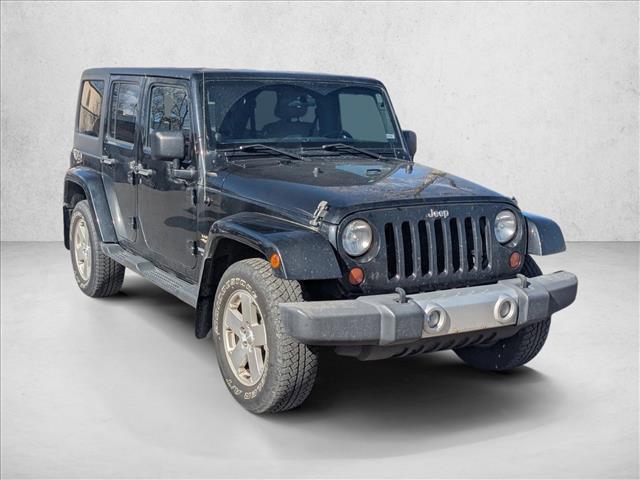 used 2012 Jeep Wrangler Unlimited car, priced at $16,990