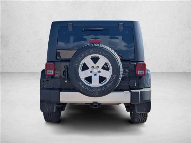 used 2012 Jeep Wrangler Unlimited car, priced at $16,990