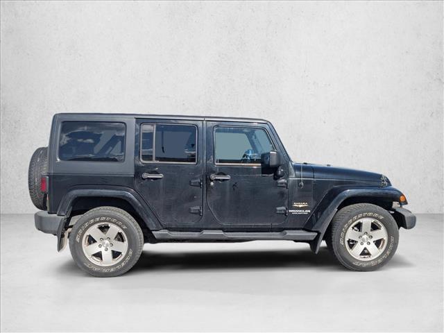 used 2012 Jeep Wrangler Unlimited car, priced at $16,990