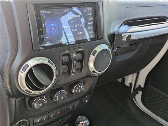 used 2018 Jeep Wrangler JK Unlimited car, priced at $23,390