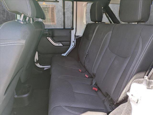 used 2018 Jeep Wrangler JK Unlimited car, priced at $23,390