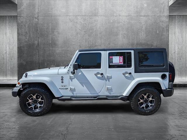 used 2018 Jeep Wrangler JK Unlimited car, priced at $23,390