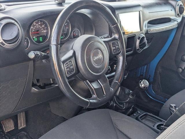 used 2015 Jeep Wrangler Unlimited car, priced at $13,990