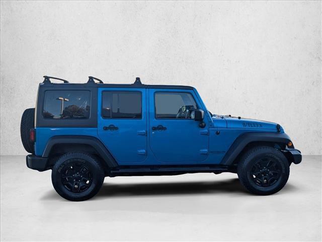 used 2015 Jeep Wrangler Unlimited car, priced at $13,990