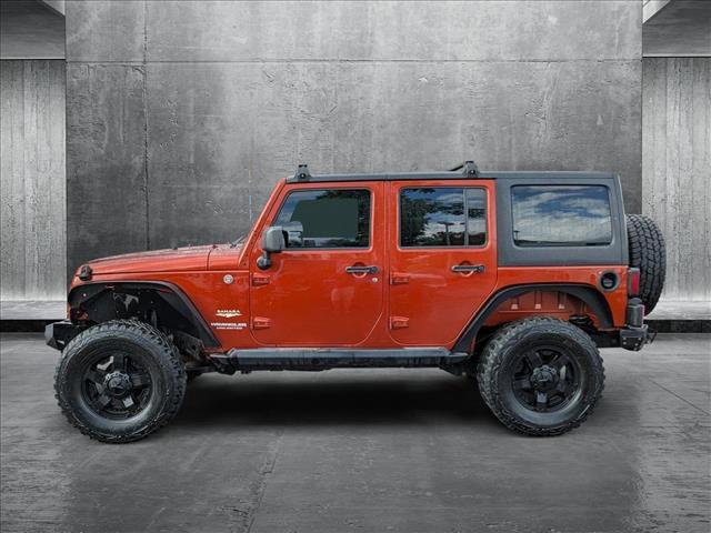 used 2014 Jeep Wrangler Unlimited car, priced at $19,949