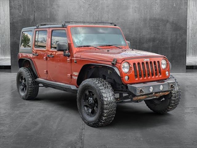 used 2014 Jeep Wrangler Unlimited car, priced at $19,949