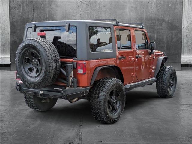 used 2014 Jeep Wrangler Unlimited car, priced at $19,949
