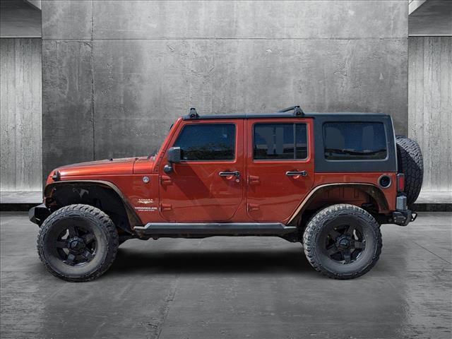 used 2014 Jeep Wrangler Unlimited car, priced at $20,790