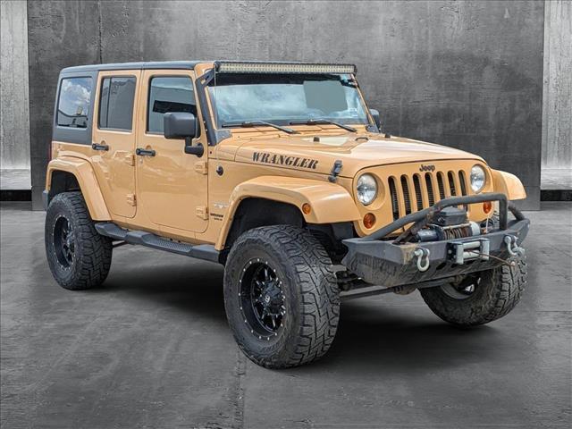 used 2013 Jeep Wrangler Unlimited car, priced at $19,815