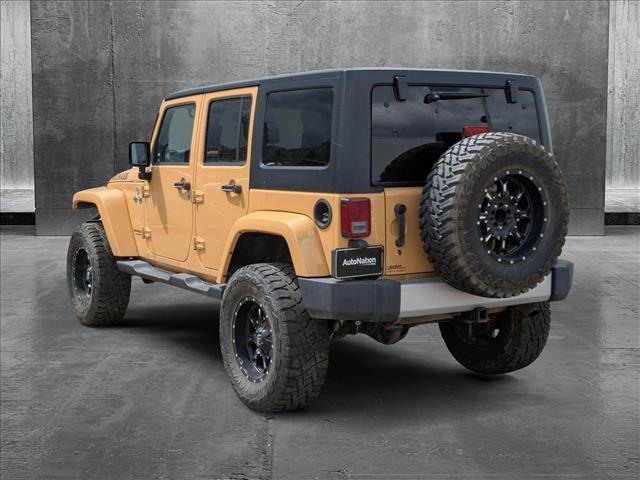 used 2013 Jeep Wrangler Unlimited car, priced at $19,815